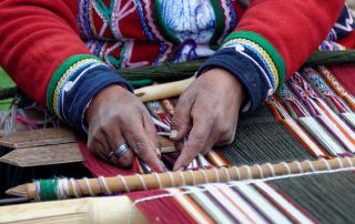 Woman weaving in Peru